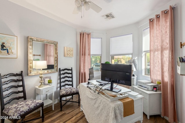 home office featuring ceiling fan and dark hardwood / wood-style floors