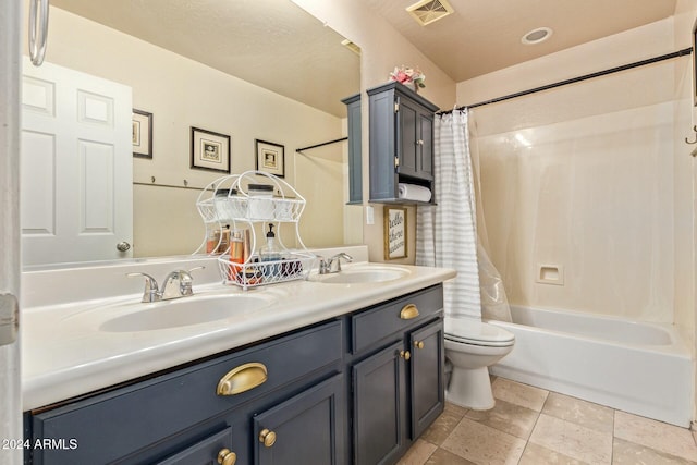 full bathroom featuring vanity, toilet, and shower / tub combo with curtain