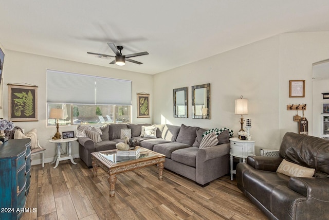 living room with ceiling fan and hardwood / wood-style floors