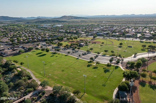 birds eye view of property featuring a mountain view