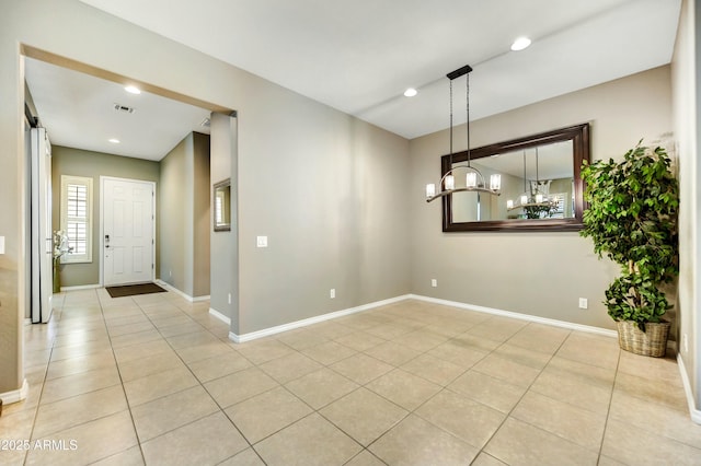 210 E Bergamot Ln, Queen Creek, AZ 85140 - unfurnished room with light tile patterned floors, baseboards, a chandelier, and recessed lighting