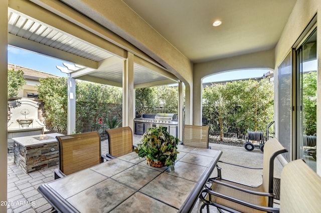 210 E Bergamot Ln, Queen Creek, AZ 85140 - view of patio featuring outdoor dining area, an outdoor kitchen, and an outdoor fire pit