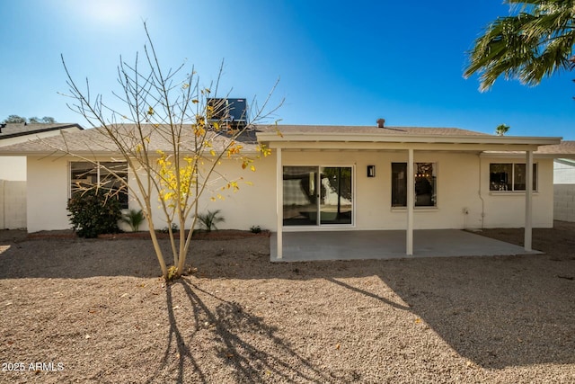 back of house with a patio and central air condition unit