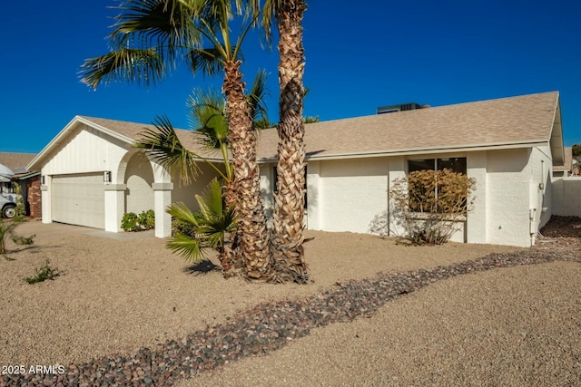 ranch-style house featuring a garage