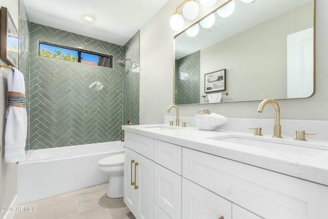 full bathroom with tiled shower / bath combo, vanity, tile patterned floors, and toilet