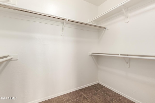 385 E Ironwood Dr, Chandler, AZ 85225 - spacious closet featuring dark tile patterned flooring