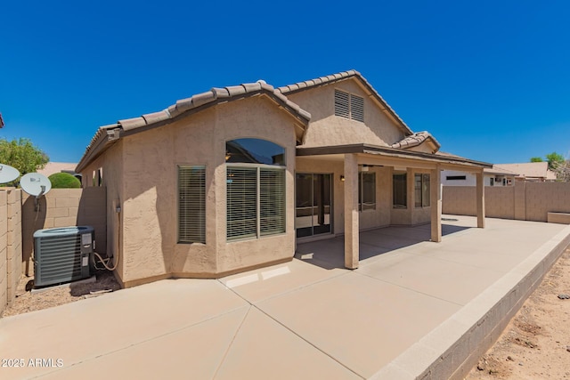 385 E Ironwood Dr, Chandler, AZ 85225 - back of house featuring central air condition unit, stucco siding, a fenced backyard, and a patio area