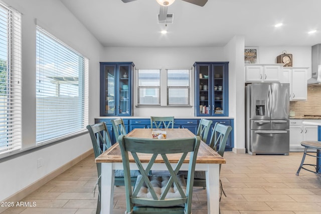 dining room featuring ceiling fan