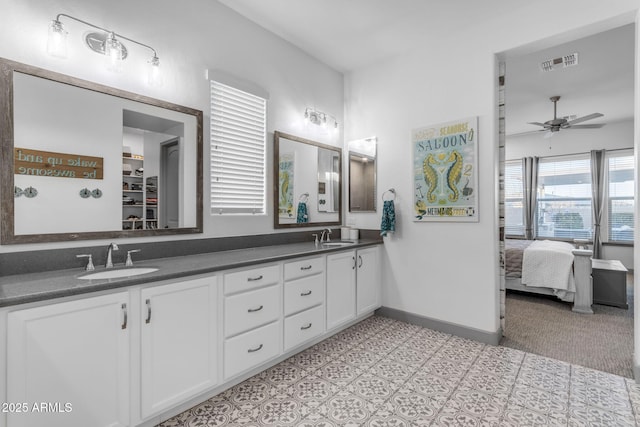 bathroom with vanity and ceiling fan