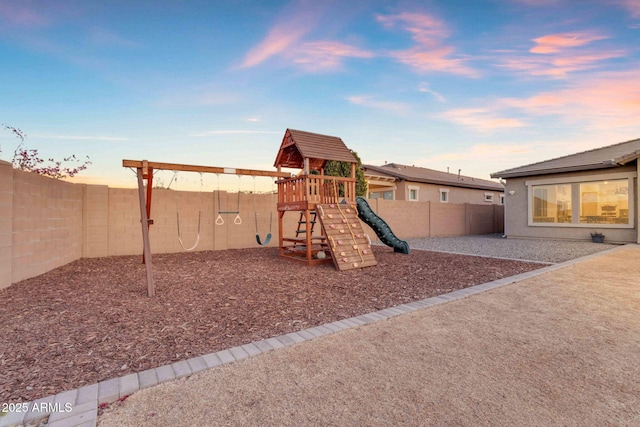 view of playground at dusk