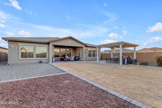 back of house featuring a patio