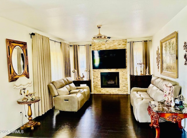 1853 N Rowen Cir, Mesa, AZ 85207 - living room featuring a large fireplace and hardwood / wood-style flooring