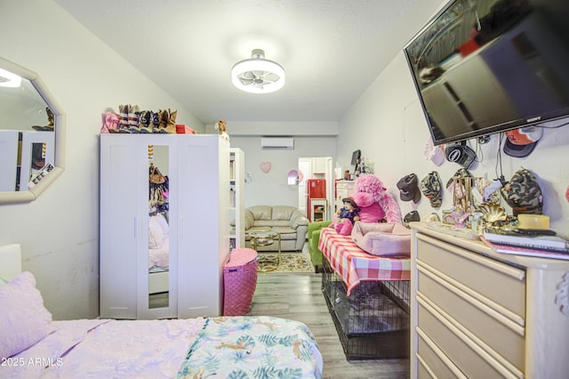 1853 N Rowen Cir, Mesa, AZ 85207 - bedroom with wood finished floors and an AC wall unit
