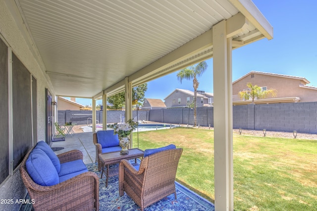 1853 N Rowen Cir, Mesa, AZ 85207 - fenced backyard with a patio area, outdoor lounge area, and a residential view