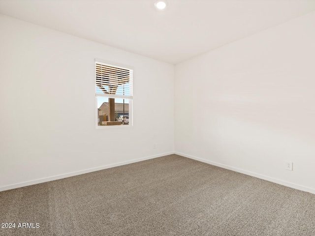 unfurnished room featuring carpet floors