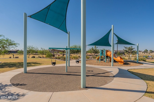 view of jungle gym with a yard