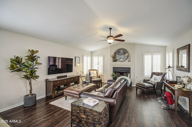 1217 S Longmore Ct, Chandler, AZ 85286 - living room with ceiling fan, dark wood finished floors, vaulted ceiling, a fireplace, and baseboards