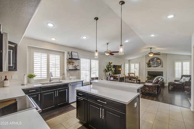1217 S Longmore Ct, Chandler, AZ 85286 - kitchen featuring dishwasher, a sink, ceiling fan, dark cabinets, and open floor plan