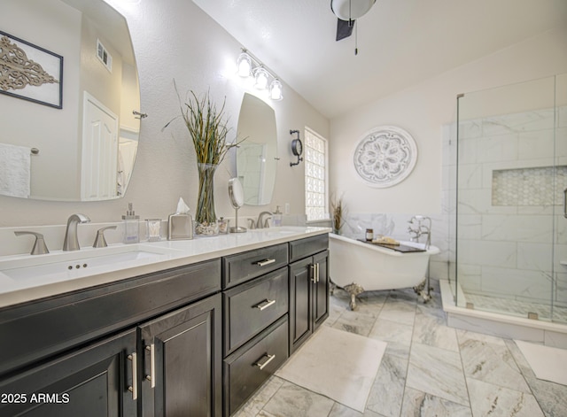 1217 S Longmore Ct, Chandler, AZ 85286 - full bath with a freestanding tub, double vanity, vaulted ceiling, marble finish flooring, and a stall shower