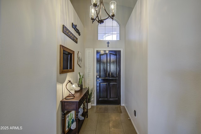 1217 S Longmore Ct, Chandler, AZ 85286 - foyer entrance with a chandelier, baseboards, and a towering ceiling