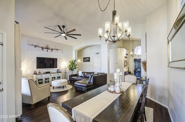 1217 S Longmore Ct, Chandler, AZ 85286 - dining room featuring arched walkways, ceiling fan, wood finished floors, and a chandelier