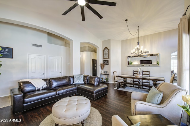 1217 S Longmore Ct, Chandler, AZ 85286 - living area with arched walkways, ceiling fan, a chandelier, baseboards, and lofted ceiling