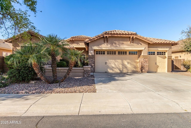 mediterranean / spanish-style home featuring a garage