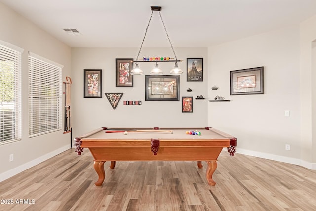 game room with hardwood / wood-style floors and pool table