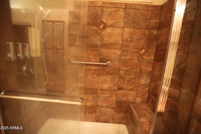 full bathroom featuring a shower stall