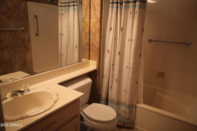 full bathroom featuring shower / bath combo, vanity, and toilet