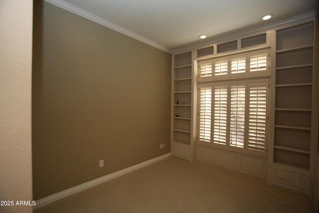 carpeted empty room with ornamental molding, recessed lighting, and baseboards