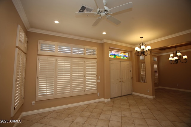 foyer featuring ornamental molding, visible vents, and baseboards