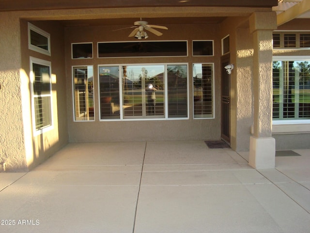 view of patio with ceiling fan