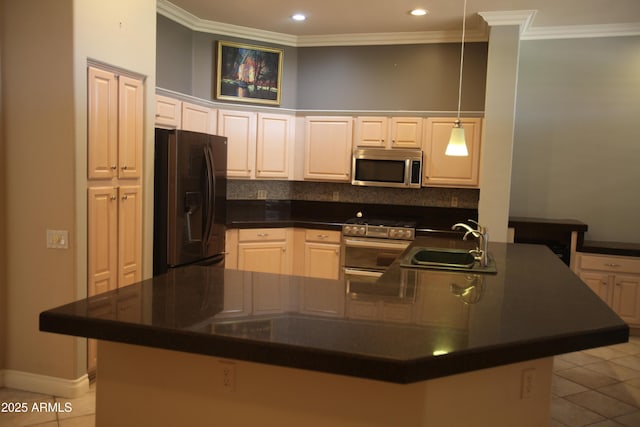 kitchen with light tile patterned floors, dark countertops, appliances with stainless steel finishes, ornamental molding, and a sink