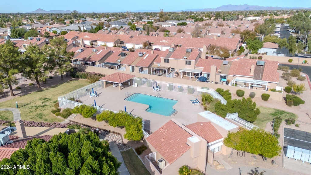 birds eye view of property featuring a mountain view