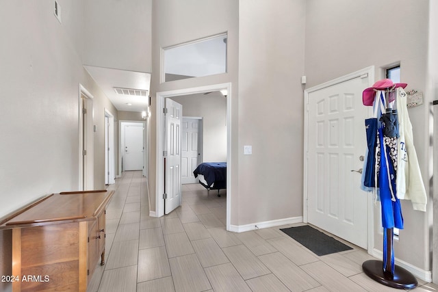 foyer entrance featuring a high ceiling