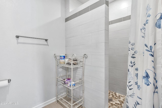 bathroom with a shower with curtain