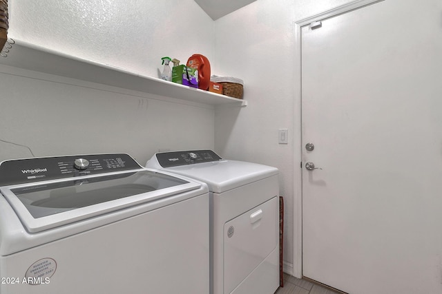 washroom with washer and clothes dryer