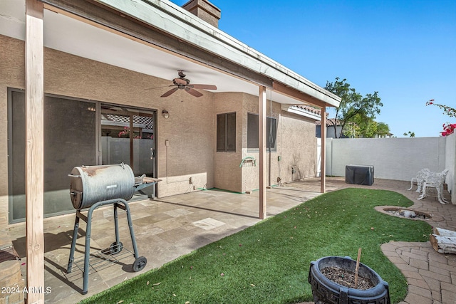 view of patio / terrace featuring ceiling fan