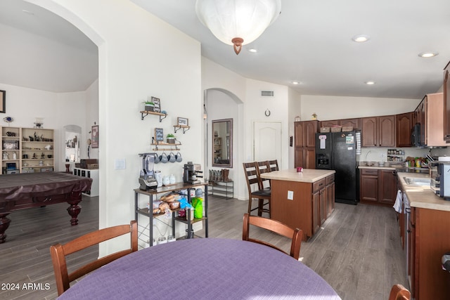 dining room featuring dark hardwood / wood-style flooring, high vaulted ceiling, and pool table