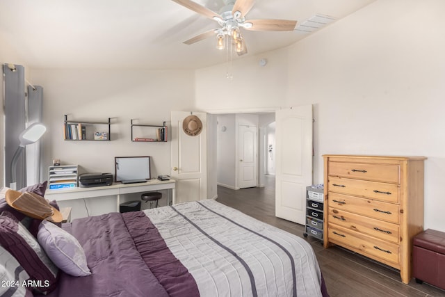 bedroom with high vaulted ceiling, ceiling fan, and dark wood-type flooring