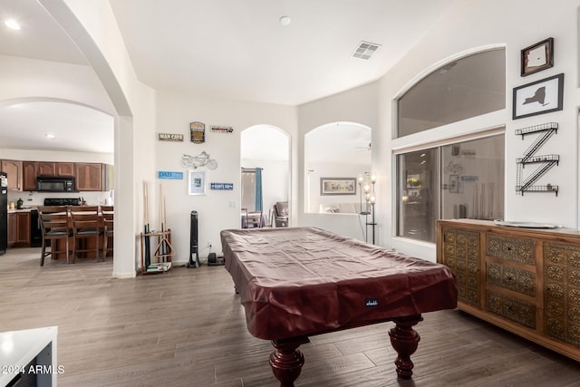 playroom featuring dark wood-type flooring and pool table