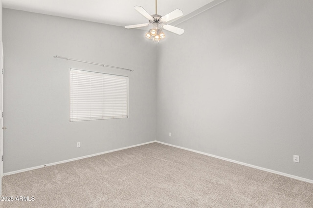 unfurnished room featuring ceiling fan and carpet floors