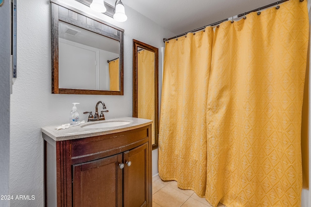 bathroom with vanity, tile patterned floors, and shower / bathtub combination with curtain