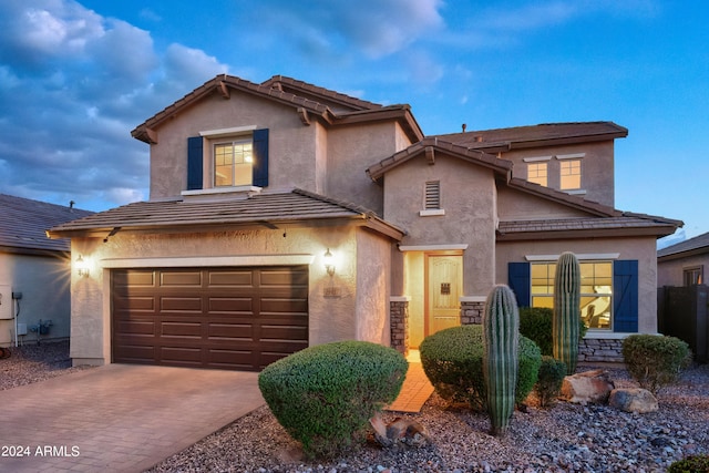 front facade with a garage