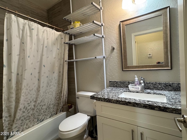 full bathroom featuring toilet, vanity, and shower / bath combo