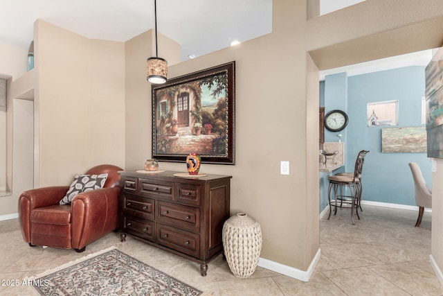 living area with light tile patterned floors