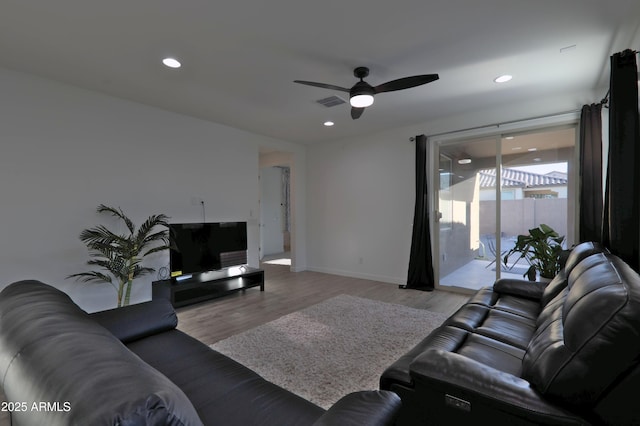 4149 E Appaloosa Rd, Gilbert, AZ 85296 - living room with recessed lighting, a ceiling fan, and light wood finished floors