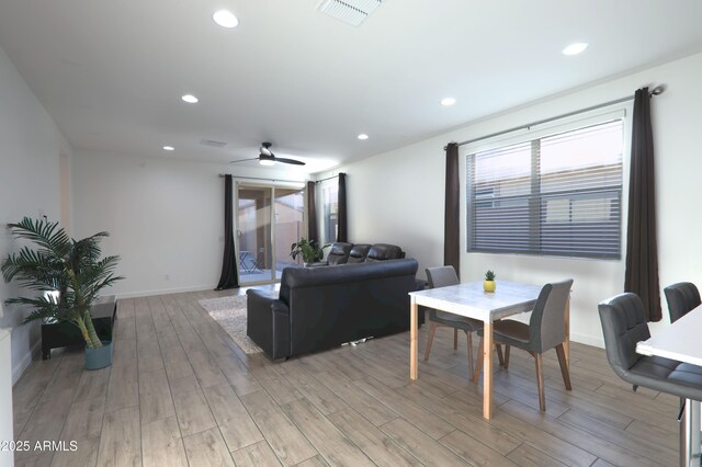 4149 E Appaloosa Rd, Gilbert, AZ 85296 - living room with light wood finished floors, visible vents, and recessed lighting