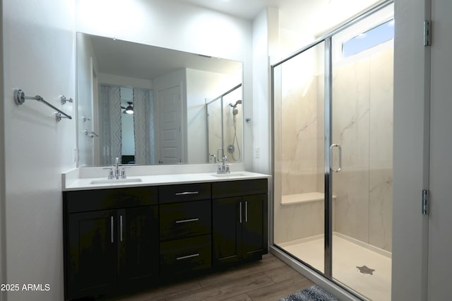 4149 E Appaloosa Rd, Gilbert, AZ 85296 - full bath with double vanity, wood finished floors, a sink, and a marble finish shower